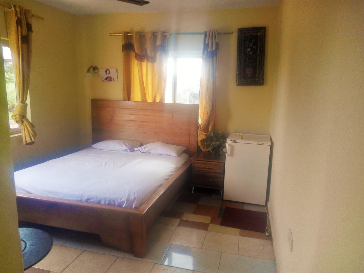 Open Space Hotel Kumasi Extérieur photo