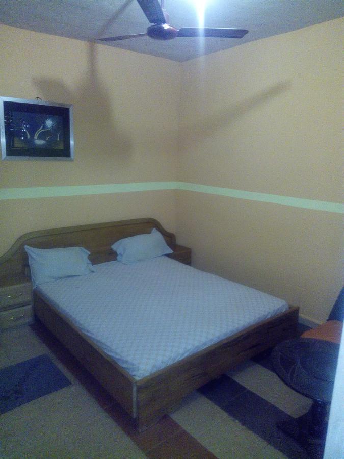 Open Space Hotel Kumasi Extérieur photo